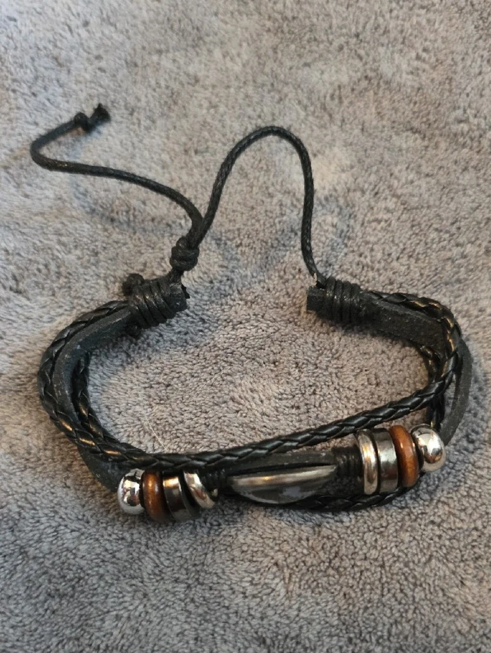 Black Leather Braided Men’s Bracelet with Dino Emblem